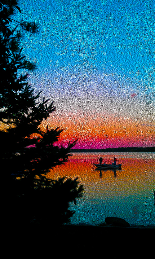 picture of boat on lake with sunset