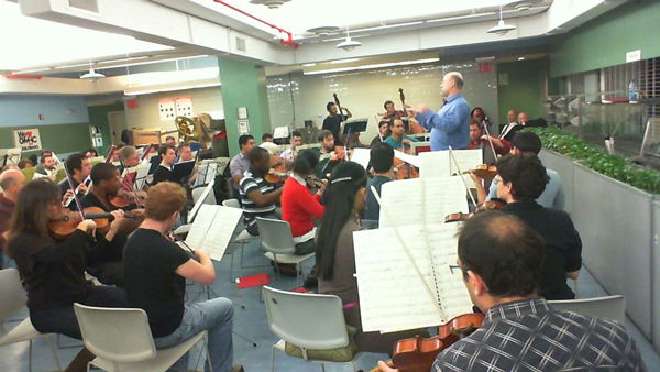 Click for Youtube video: Composer Brian Wilbur Grundstrom conducts the Queer Urban Orchestra