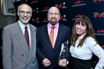 Composer Brian Wilbur Grundstrom receives Outstanding Emerging Artist Award at the Mayor's Arts Awards in Washington DC with presenters Robin Bronk and Jonathan Katz