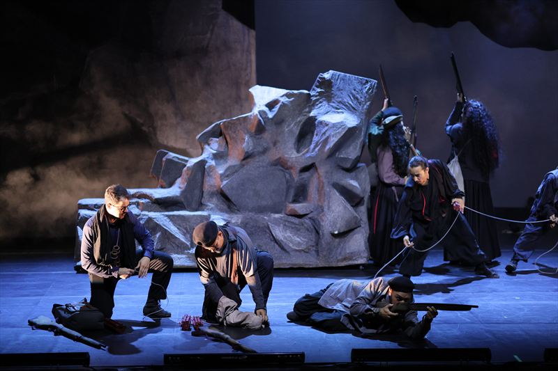 From left: Rafael Ribeiro as Robert Jordan, Vitor Hugo de Sá do Monte Lima as Anselmo, Marcus Danielo dos Ouros as Agustín, Iago Gabriel Melo de Jesus da Silva. Photo by Robson Cesco.