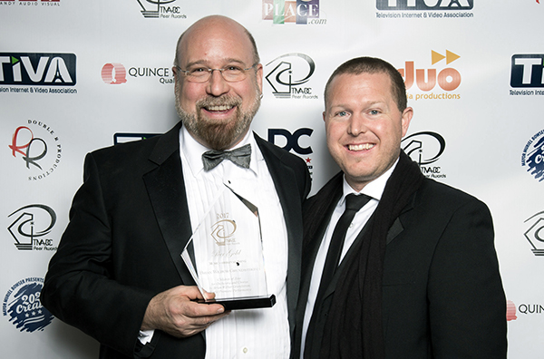 Composer Brian Wilbur Grundstrom receives Gold Peer Award for Children of Zeus with Maestro Jeffrey Dokken